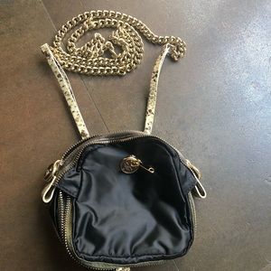 Henri Bendel crossbody Bag with gold chain.